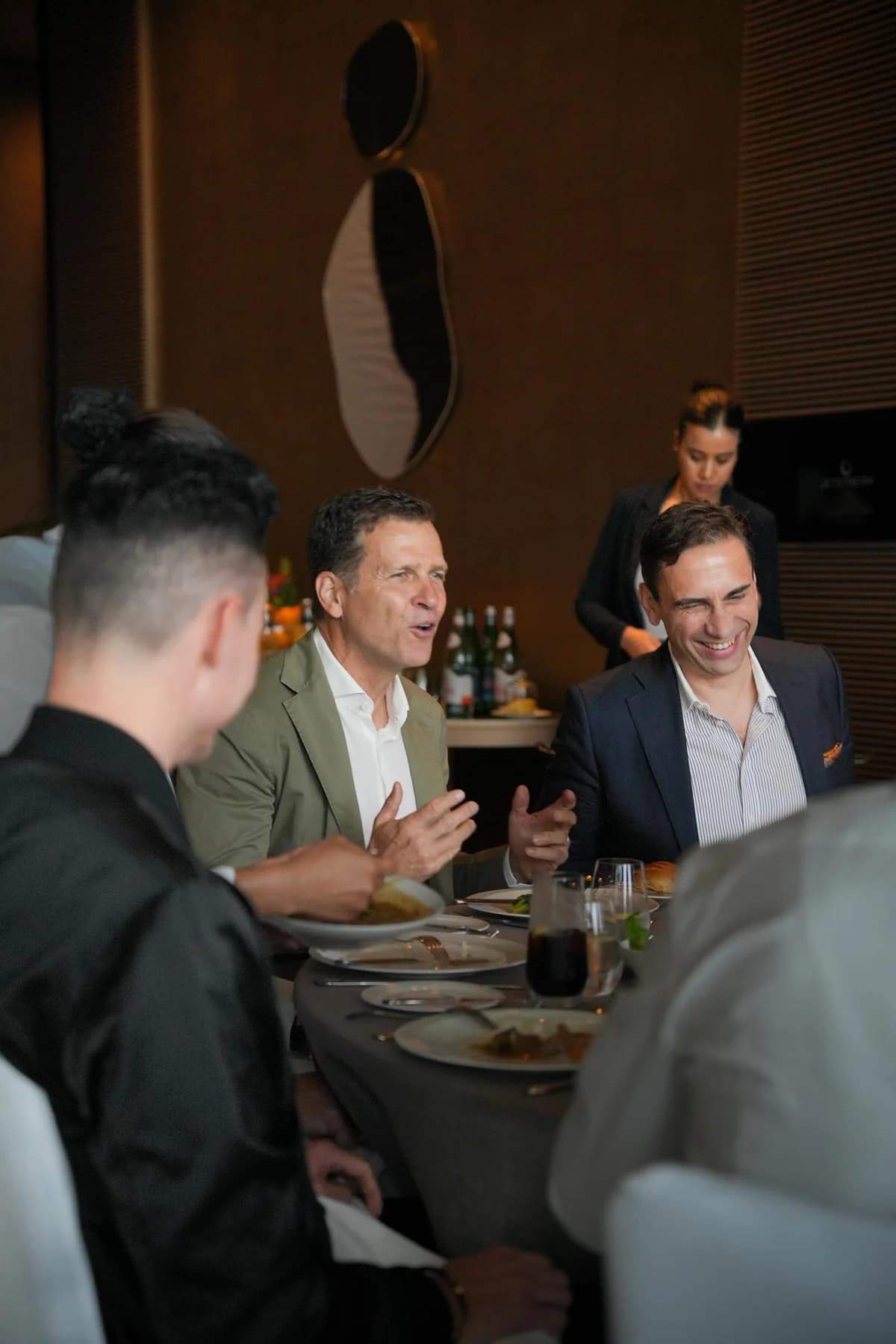 Jetstream members in conversation at a network dinner